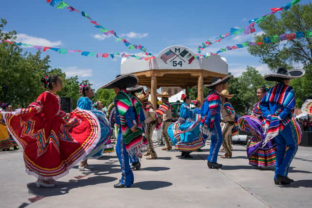 Ballet Folklorico de la Tierra del Encanto dancers entertain attendees during the Cinco De Mayo Fiesta on the plaza in Mesilla, New Mexico