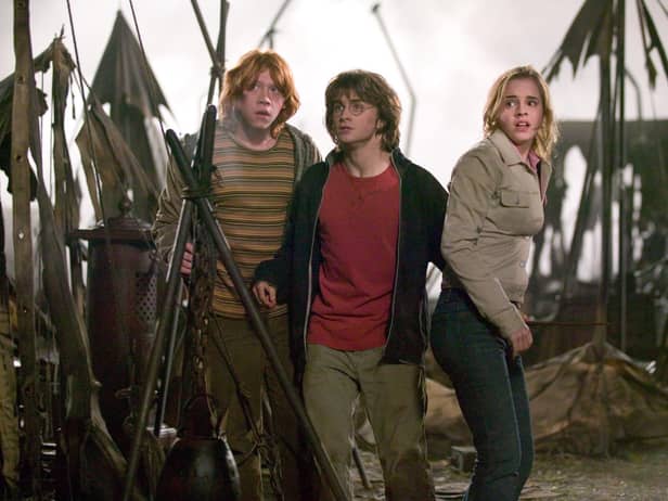 RUPERT GRINT as Ron Weasley, DANIEL RADCLIFFE as Harry Potter and EMMA WATSON as Hermione Granger in Warner Bros. Pictures’ ‘Harry Potter and the Goblet of Fire’.