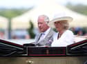 The Prince of Wales with The Duchess of Cornwall are seen in the royal procession during Day Two of Royal Ascot 2022