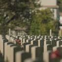 Kit Harrington visits a war cemetery