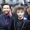 David Tennant (L) and Ty Tennant (R) pose on the red carpet arriving for the UK premiere of the film Tolkein
