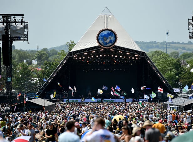 <p>Crowds of festival-goers watch Tom Odell perform on the Pyramid Stage during day three of Glastonbury Festival 2019</p>