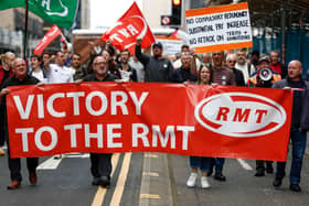 RMT supporters march from the offices of Network Rail as a nationwide strike called by the RMT Union was held today on July 27, 2022 in Glasgow, Scotland (Photo by Jeff J Mitchell/Getty Images)
