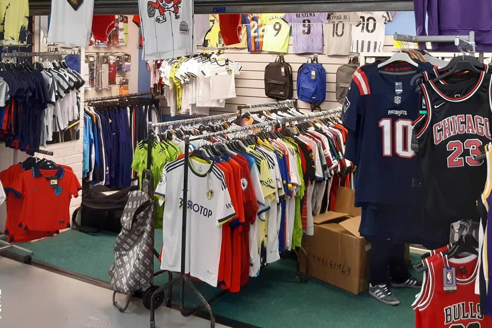 Four tonnes of fake football shirts have been seized by cops during raids ahead of the World Cup - worth a whopping £500,000. Cops raided lock ups and houses across the country in a crackdown on counterfeit goods, which they said are linked to organised criminal groups.