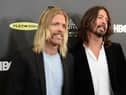  Musicians Taylor Hawkins and Dave Grohl of Foo Fighters arrive at the 28th Annual Rock and Roll Hall of Fame Induction Ceremony. The band confirmed in their New Year’s message they will continue despite Hawkins’ death 