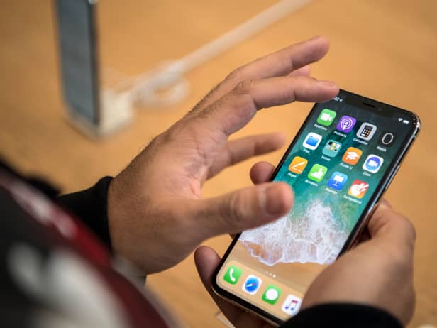 iPhone users could save hundreds of pounds using this clever trick (Photo by Carl Court/Getty Images).