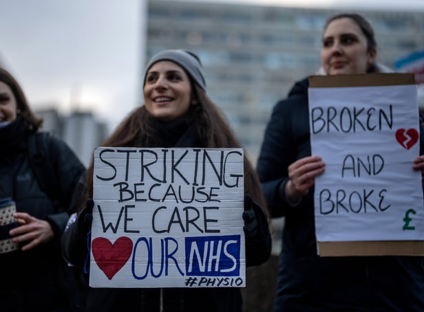 <p>NHS physiotherapists take part in a strike outside of St Thomas’ Hospital on January. (Photo by Carl Court/Getty Images)</p>