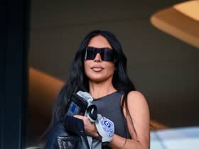 TOPSHOT - US socialite Kim Kardashian attends to watch the French L1 football match between Paris Saint-Germain (PSG) and Stade Rennais FC at The Parc des Princes Stadium in Paris on March 19, 2023. (Photo by FRANCK FIFE / AFP) (Photo by FRANCK FIFE/AFP via Getty Images)
