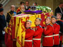 The eight 1st Battalion Grenadier Guards who carried the coffin of Queen Elizabeth II have been honoured for the service to the late monarch