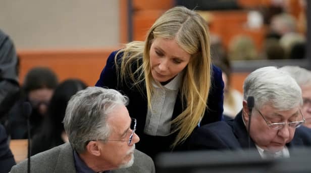 Gwyneth Paltrow appeared to whisper to Terry Sanderson after the verdict of her ski crash legal battle was revealed - Credit: Getty Images