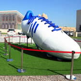 The world's largest football shoe by artist M. Dileef has been put on display at Katara Cultural Village (photo: idhik Keerantakath/ Eyepix Group/Future Publishing via Getty Images)