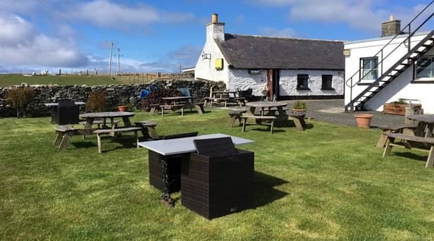 The gastropub is being sold for £399,000 on an island famed for its white sand beaches. It has a gigantic beer garden and a rustic bar and was refurbished during the pandemic.  (Courtesy Alice Bagley / SWNS)