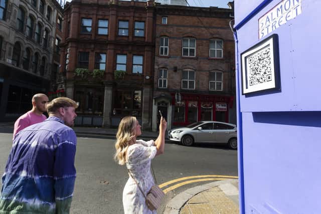 Laybuy will be launching a new a brand new in-app shopping experience. A mural has been created and magician and illusionist Ryan Tricks preforms street magic for people to promote the launch, pictured in Manchester City Centre, Sep 7 2021.