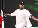 American rapper Chris Brown could be arrested over an alleged nightclub assault if he comes back to the UK.  (Photo by Candice Ward/Getty Images)