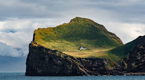 ElliÃ°aey (Icelandic pronunciation: is a small island south of Iceland. It is the most northeastern of the Vestmannaeyjar (Westman Islands), an archipelago consisting of 15 to 18 islands and assorted smaller rocks.