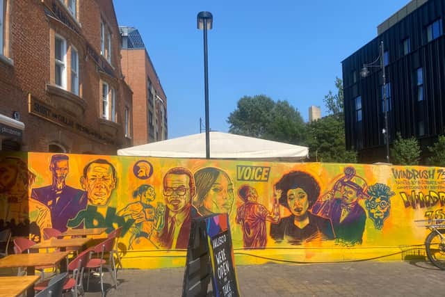 A mural to mark the Windrush 75th anniversary in Brixton Village.