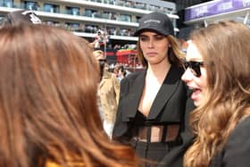 Cara Delevingne has hit back at F1 fans after an awkward encounter with Sky Sports presenter Martin Brundle
