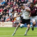 Goals from Josh Grinnelly and Lawrence Shankland gave Hearts the three points