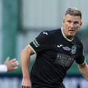 Evans, pictured playing in a Hanlon Stevenson Charity Foundation game last year,  remains deeply invested in Hibs - 35 years after signing as a young striker from Rotherham.