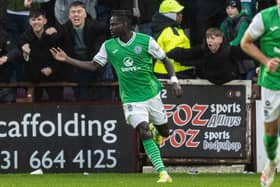 Elie Youan celebrates after his first of two goals for Hibs during Edinburgh derby