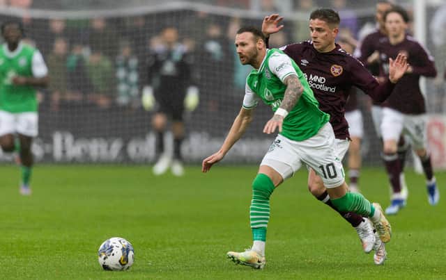 Socceroos stars Martin Boyle and Cammy Devlin in opposition at Tynecastle