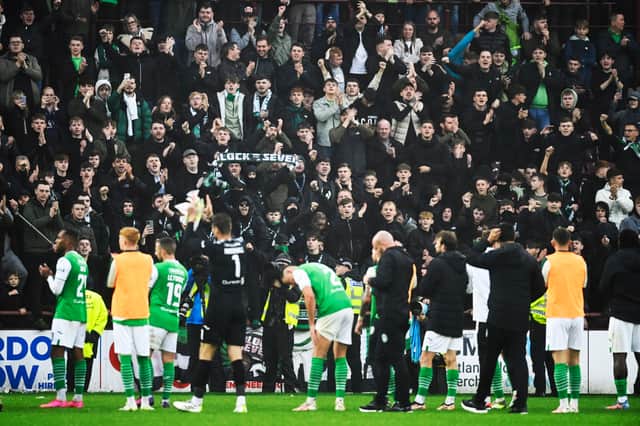 Hibs players thanks fans after Hearts game.