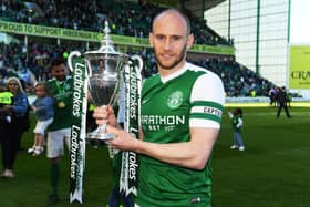 David Gray celebrates with the Championship trophy in 2017
