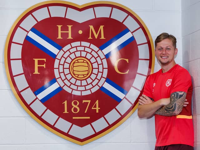Hearts defender Frankie Kent is relishing the chance to face Celtic. Pic: SNS