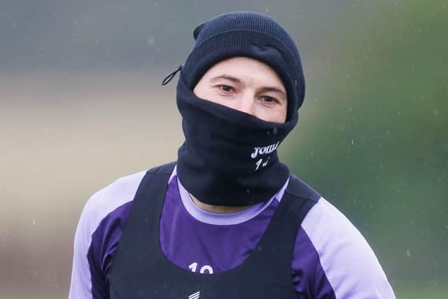Ninja fashion was in style as Le Fondre trained in stormy conditions yesterday - preparing for a tempest at Ibrox today. 