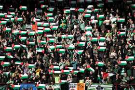 The Celtic away fans all show their support for Palestine amid the ongoing Israeli-Palestinian conflict