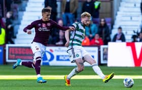 Hearts winger Kenneth Vargas chases Celtic defender Liam Scales. Pic: SNS