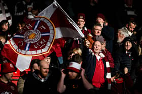 Hearts fans wave the trusted maroon and white ahead of kick-off at Hampden Park.