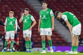 A picture of dejection - Hibs players at full-time. 