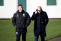 Who ya gonna call? Hibs director of football Brian McDermott and head coach Montgomery at the training ground yesterday.