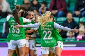 Hibs celebrate scoring their second of the day. Credit: Malcolm Mackenzie