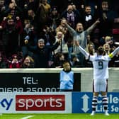 Hearts captain Lawrence Shankland celebrates helping his club to fourth place