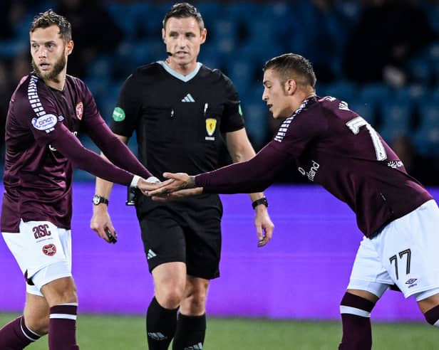 Hearts midfielder Jorge Grant with winger Kenneth Vargas during the Viaplay Cup quarter-final at Kilmarnock. Pic: SNS
