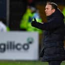 Wrong way up? County boss Adams delivered a big thumbs down to Scottish football last weekend.