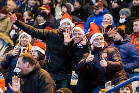Hearts fans feel the festive spirit and find the camera.
