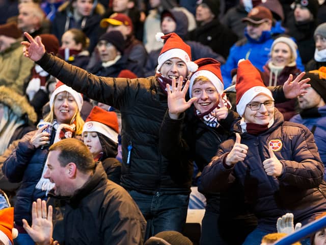 Hearts fans feel the festive spirit and find the camera.