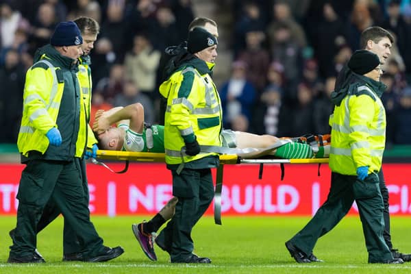 Campbell is stretchered off at Easter Road