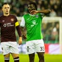 Hearts' Lawrence Shankland and Hibs' Rocky Bushiri in action at Easter Road