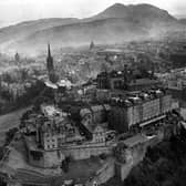 Aerial shot of the centre of Edinburgh with Edinburgh Castle and Arthur's Seat - with smog over the city. This photo was taken in August 1952.