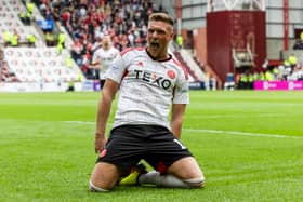 Mattie Pollock celebrates after scoring for Aberdeen in May 2023
