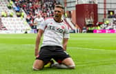 Mattie Pollock celebrates after scoring for Aberdeen in May 2023