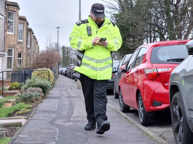 Parking attendants were enforcing the pavement parking ban in Edinburgh for the first time today, Monday, January 29.