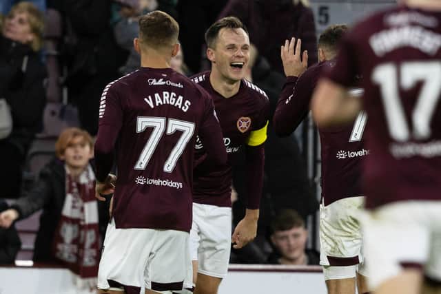 Hearts' Lawrence Shankland celebrates scoring yet another goal as Jambos won 2-0.