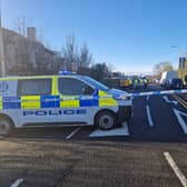 Police have closed Craigs Road amid an ongoing incident