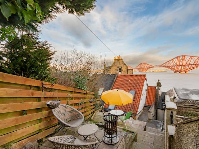 There is a good sized private, terraced, garden to the rear of the property with seating areas providing stunning panoramic views over the Firth of Forth and historic Forth Bridge, all the way to Fife and beyond. There is also a rear access gate from Stoneycroft Lane. Please note a neighbouring property has shared right of access leading to their own garden.