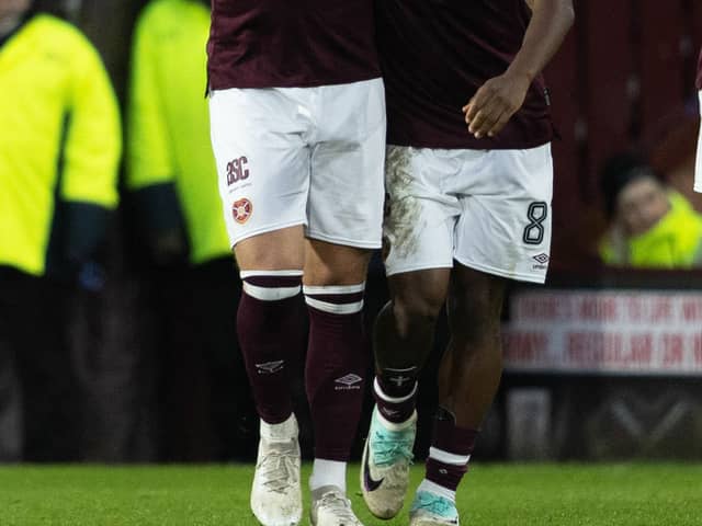 Lawrence Shankland and Dexter Lembikisa celebrate the new loan star's first goal. 